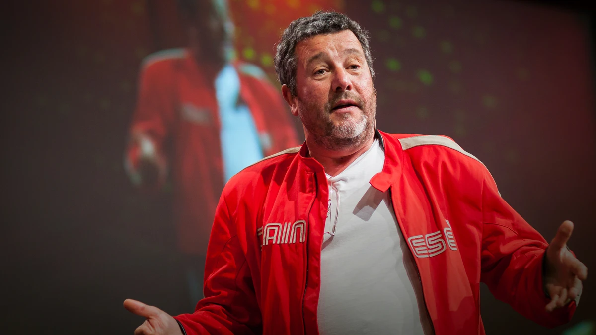 Philippe Starck speaking on the TED stage.